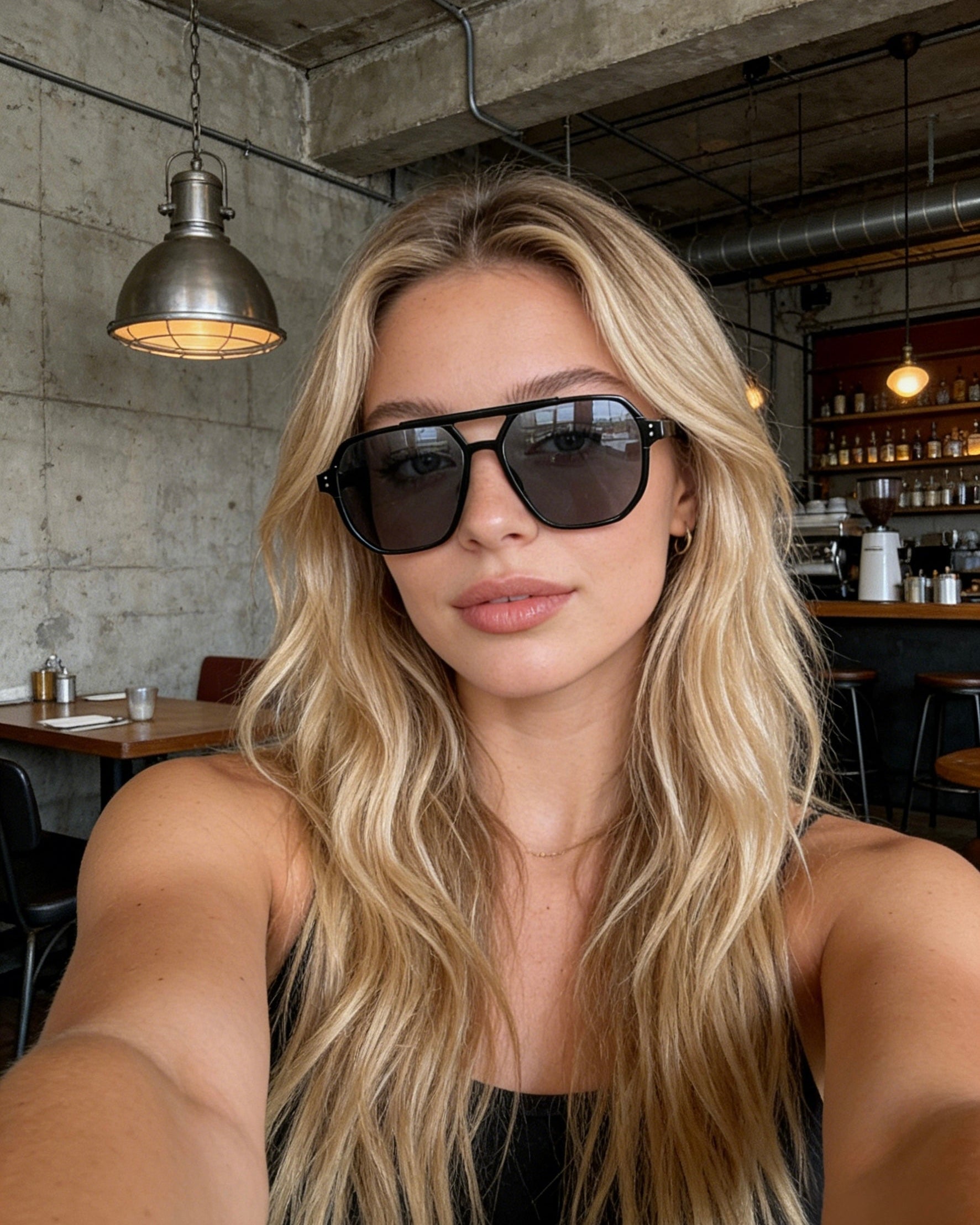 Oversized black aviator sunglasses with a flat top bridge, polarized lenses, and UV protection, unisex retro square eyewear.