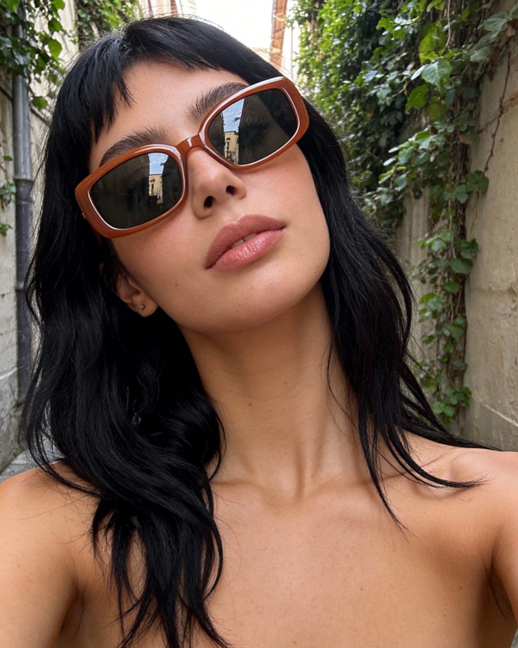 Amber tortoise shell rectangle sunglasses, 90s retro style featuring polarized lenses and UV400 protection, chic everyday fashion accessory.