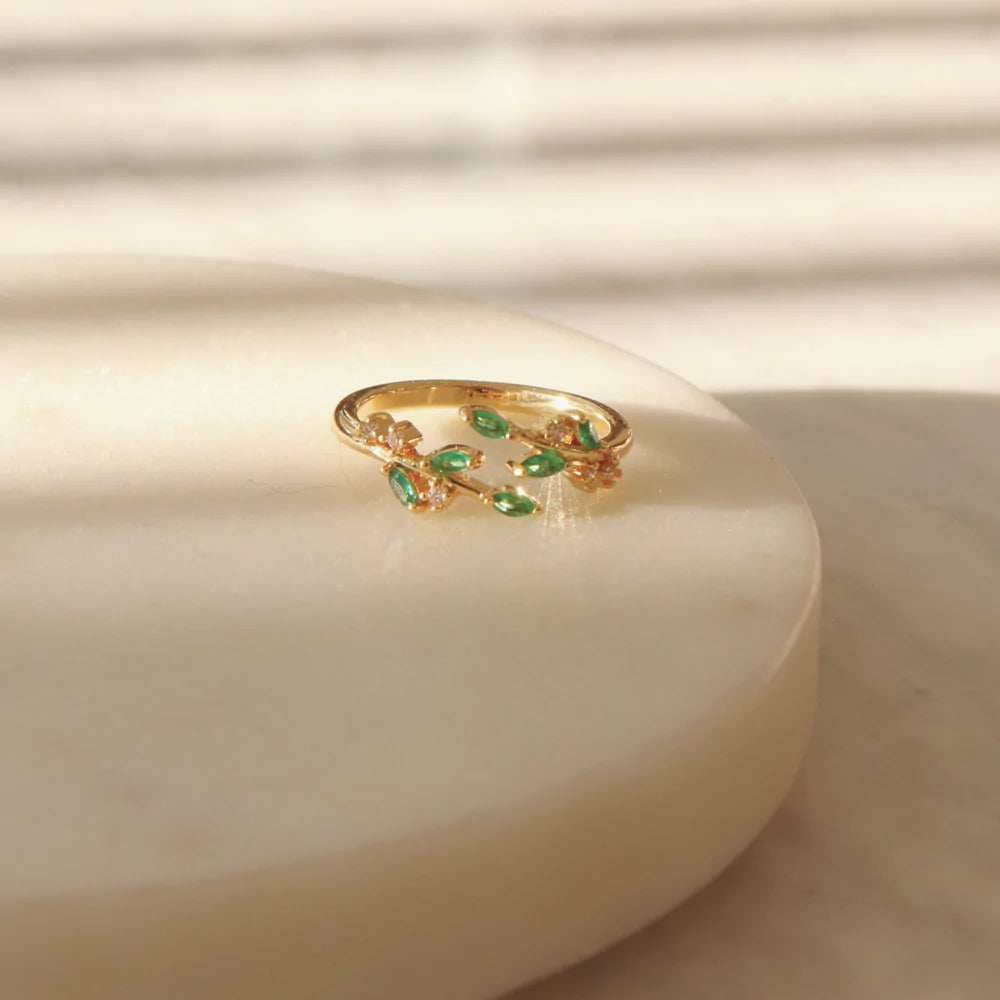 Emerald green zircon Adeline leaf ring showcasing rich color and detailed design