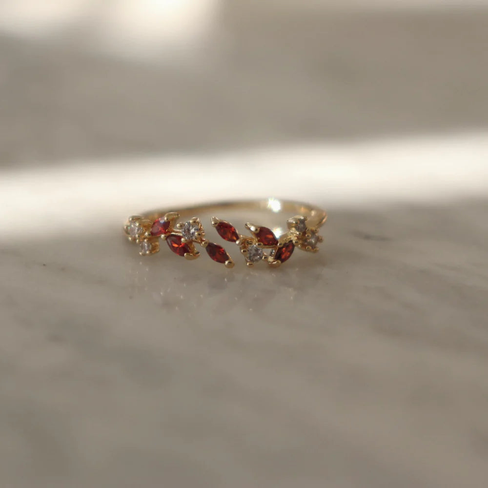 Passionate red zircon Adeline ring displaying vibrant stone in leaf-shaped setting