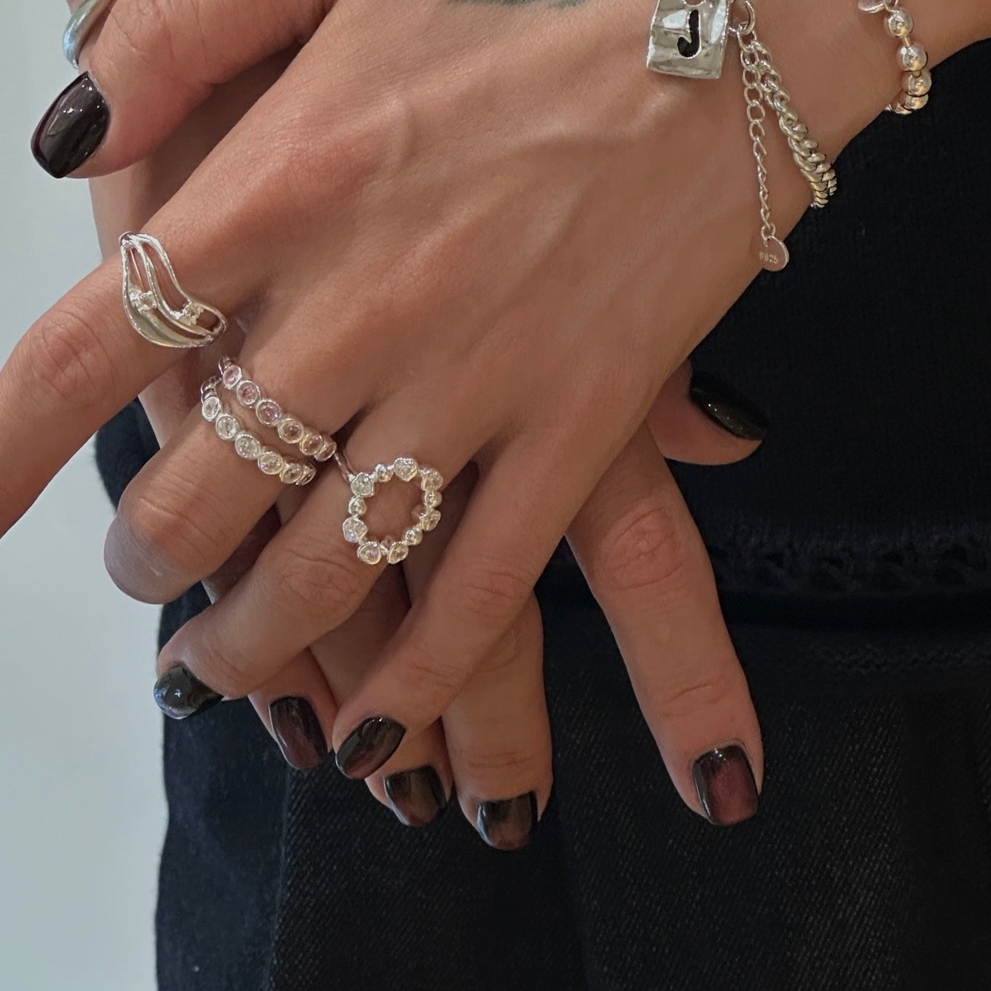 Side profile of the Maelie sterling silver ring, emphasizing the low-profile setting and smooth comfort fit.