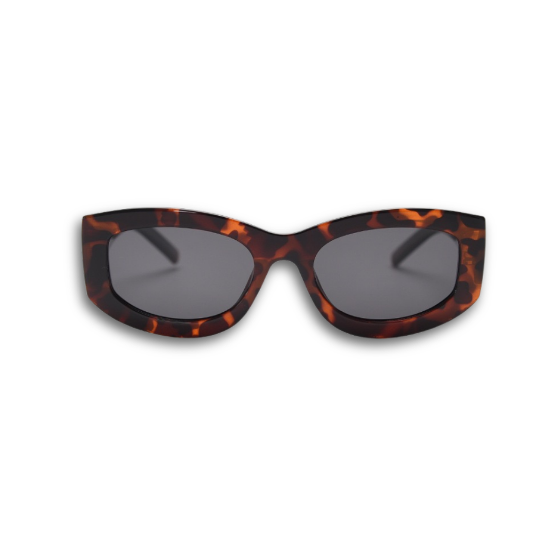 Bold unisex square sunglasses by By Charley, featuring a chunky tortoiseshell frame and polarized lenses that provide 100% UV protection and anti-glare functionality for a confident, architectural aesthetic.