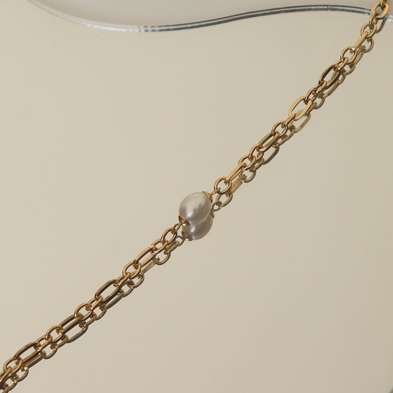 Detailed view of Paige bracelet's substantial square links and secure clasp design