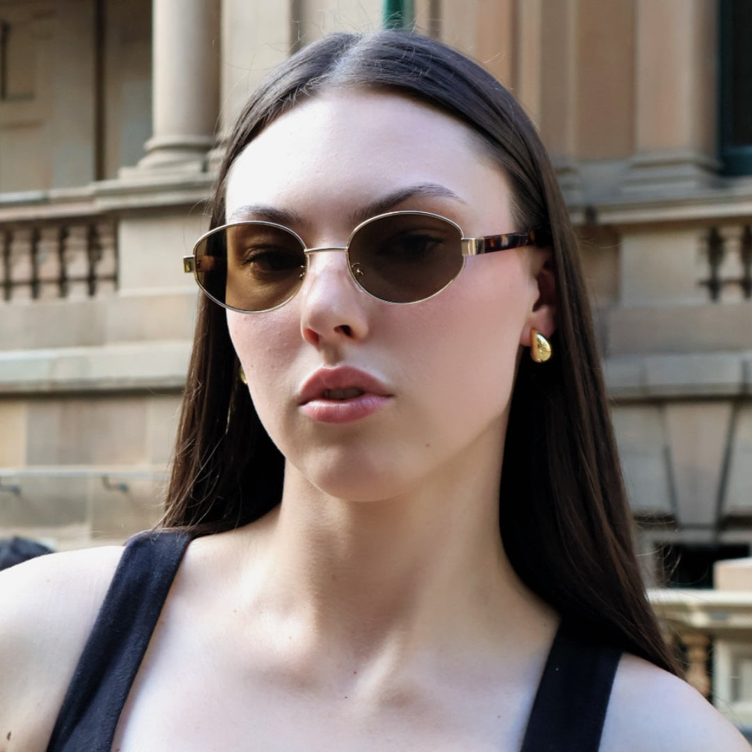 Unisex vintage oval sunglasses with modern polarised lenses, Stylish sunglasses inspired by classic vintage fashion.