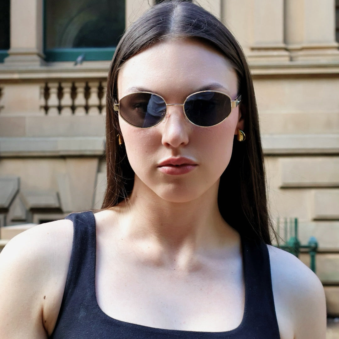 Unisex vintage oval sunglasses with modern polarised lenses, Stylish sunglasses inspired by classic vintage fashion.